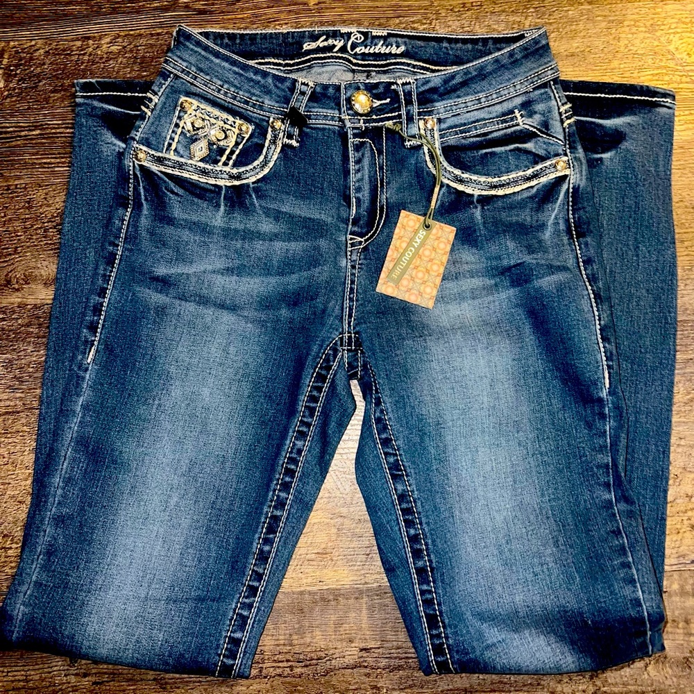 In new condition with sparkly beads and some sequins size 7